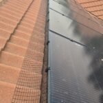 Completed black PVC-coated solar pigeon-proofing mesh installation secured with UV-rated Solar Fast Fix clips.